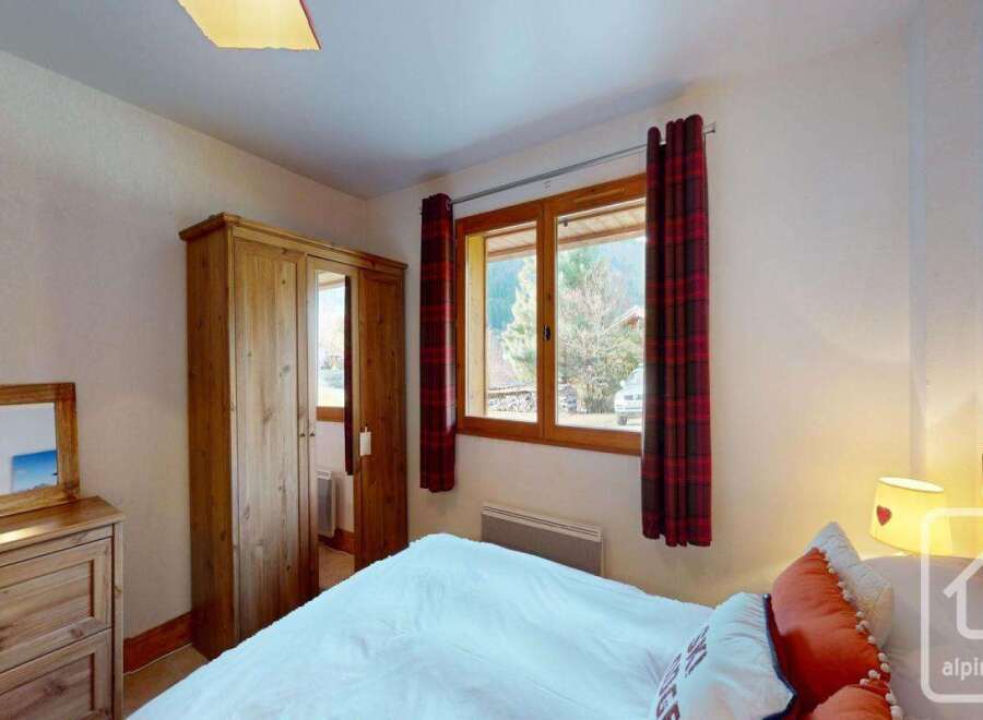 Discover the charm of this cozy bedroom, perfect for a relaxing retreat.