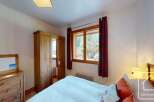 Discover the charm of this cozy bedroom, perfect for a relaxing retreat.