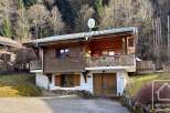 Discover this charming chalet nestled in a serene mountain setting.