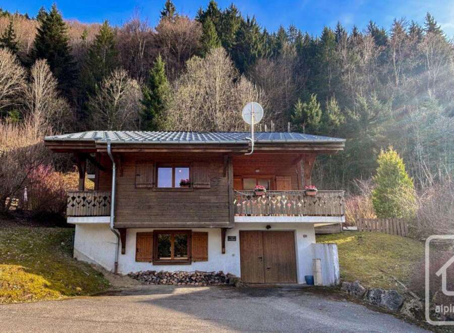 Discover this charming chalet nestled in a serene mountain setting, perfect for a peaceful retreat.