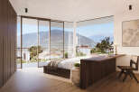 Experience luxury living with this stunning bedroom featuring breathtaking mountain views.