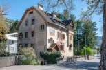 This stunning property showcases classic architectural design with its unique facade and intricate details.