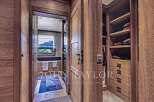 Step into luxury with this stunning property featuring exquisite wooden details throughout.