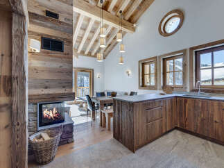 Experience the warmth and charm of this stunning chalet-style home.