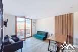 Discover this stunning property featuring a modern living space with a cozy sofa and armchairs.