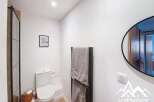 This modern bathroom features a sleek design with a minimalist aesthetic.