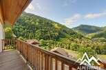Enjoy breathtaking mountain views from this charming property.