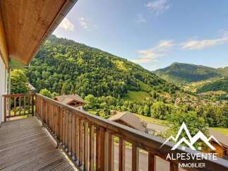 Enjoy breathtaking mountain views from this charming property.