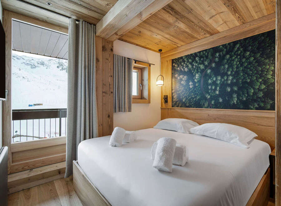 Experience the ultimate in alpine luxury with this stunning bedroom.