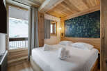 Experience the ultimate in alpine luxury with this stunning bedroom.