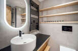 This modern bathroom features a sleek design with a minimalist aesthetic.