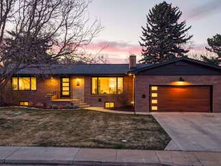 Discover the charm of this stunning brick home, perfectly blending classic design with modern appeal.