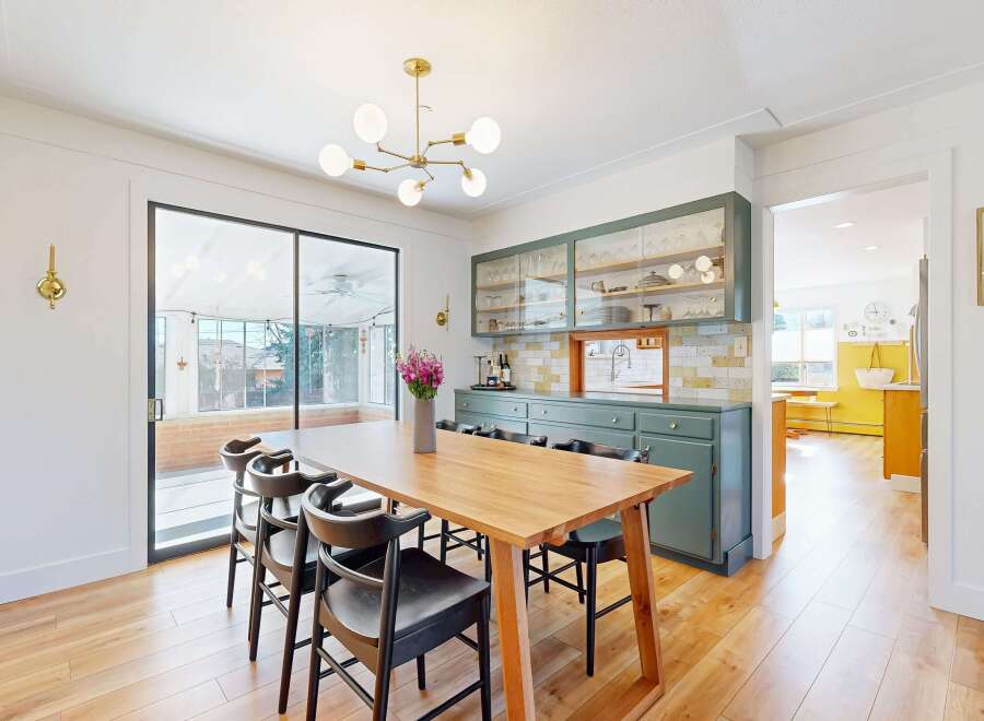 This stunning dining room features a modern design with a touch of elegance.