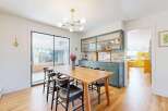 This stunning dining room features a modern design with a touch of elegance.