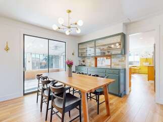 This stunning dining room features a modern design with a touch of elegance.