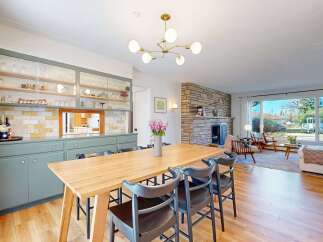 Step into this stunning dining room, perfect for hosting gatherings.