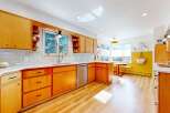 This stunning kitchen boasts a modern design with sleek cabinetry and ample storage.