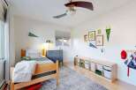 This charming bedroom offers a cozy and inviting atmosphere, perfect for a child's retreat.