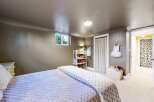 This charming bedroom offers a cozy and inviting atmosphere, perfect for relaxation.