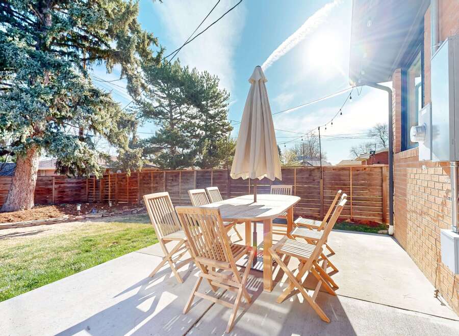 Enjoy outdoor living at its finest in this stunning backyard oasis.