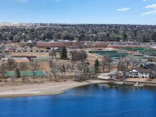 Discover the charm of lakeside living with this stunning property! Enjoy breathtaking views of the water and surrounding landscape.