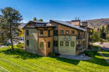Discover luxury living at Northstar! This stunning property boasts a modern design with beautiful wood accents and multiple balconies.