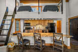 This stunning property boasts a modern kitchen with granite countertops and ample cabinet space, perfect for culinary enthusiasts.