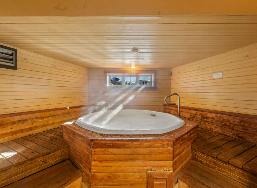 Step into relaxation in this inviting spa room.
