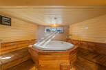 Step into relaxation in this inviting spa room.