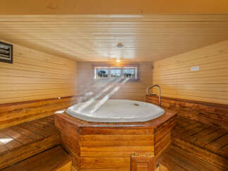Step into relaxation in this inviting spa room.