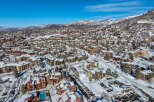 Discover the charm of this stunning mountain property, nestled in a picturesque winter wonderland.