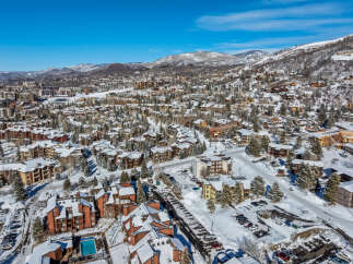 Discover the charm of this stunning mountain property, nestled in a picturesque winter wonderland.