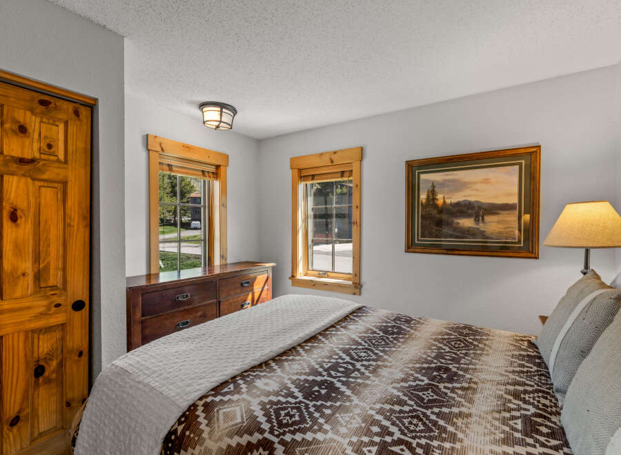 This cozy bedroom features a warm and inviting atmosphere.