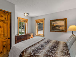 This cozy bedroom features a warm and inviting atmosphere.