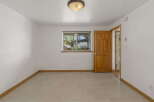 This inviting room features a bright and airy atmosphere, perfect for a variety of uses.