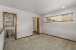 Step into this bright and airy bedroom, featuring a private bathroom and ample closet space.