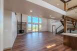Step into luxury with this stunning property featuring expansive windows that flood the space with natural light.
