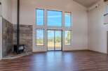 Experience the epitome of modern living in this stunning property, featuring expansive windows that flood the interior with natural light and offer breathtaking views.