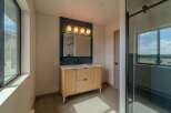 Step into modern elegance with this stunning bathroom design.