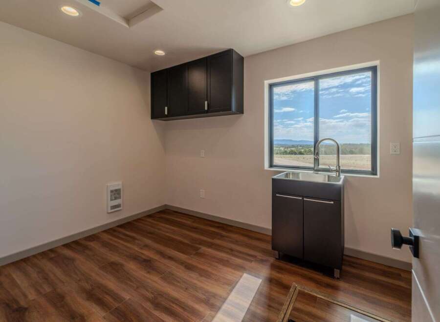 This modern utility room boasts sleek design and functionality.