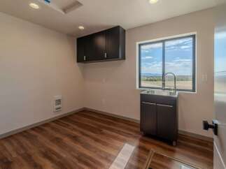 This modern utility room boasts sleek design and functionality.