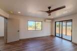 Step into modern elegance with this stunning property, featuring a spacious interior with beautiful hardwood floors.