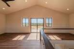 Step into this stunning modern home and be captivated by its open-concept design and breathtaking views.