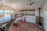 This stunning property boasts a modern, open-concept design with high ceilings and ample natural light.