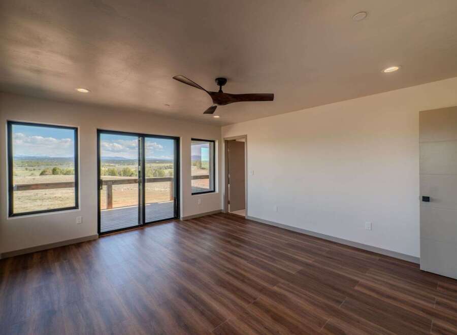 Step into this stunning property featuring expansive windows that frame breathtaking views.