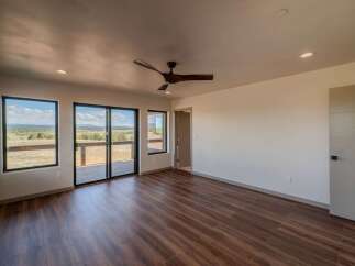 Step into this stunning property featuring expansive windows that frame breathtaking views.