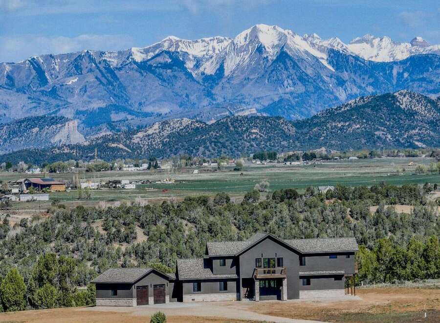This stunning property offers breathtaking mountain views and a serene, natural setting.