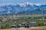 This stunning property offers breathtaking mountain views and a serene, natural setting.