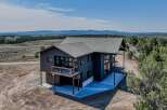 This stunning modern home offers breathtaking views and luxurious living.