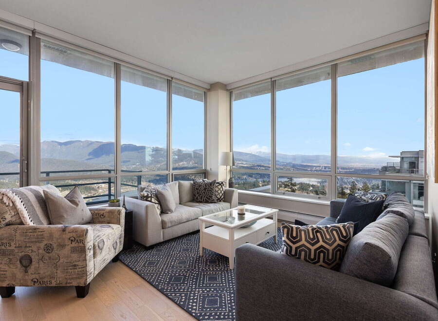 Experience breathtaking views from this stunning condo with floor-to-ceiling windows.